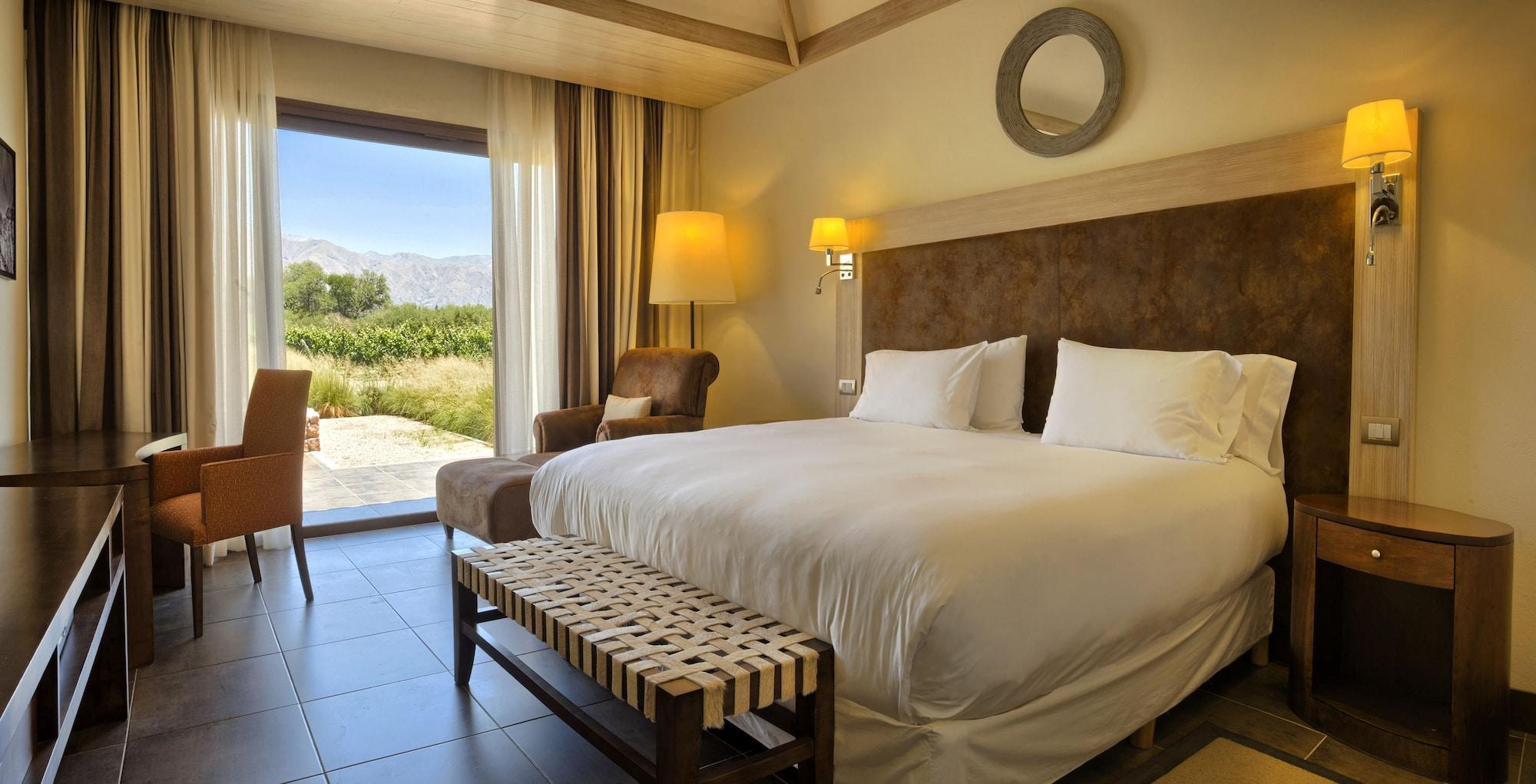 Hotel Grace Cafayate Esterno foto A room at the hotel