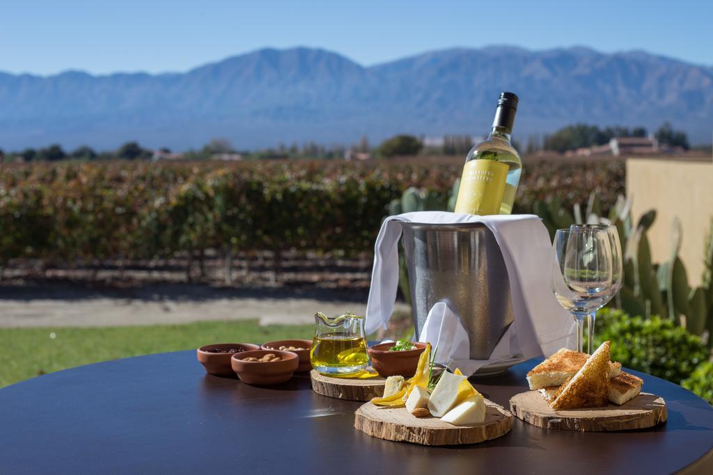 Hotel Grace Cafayate Esterno foto A bottle of wine from the region